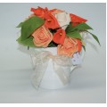 White Ceramic Milk Jug with Orange and Ivory floral arrangement of Lillies and Roses with Ribbon Bow